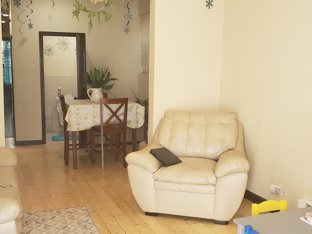 954 E 76th St, Chicago, IL 60619 - living area with light wood-style flooring