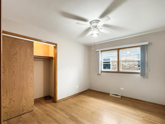 4841 N Natchez Ave, Chicago, IL 60656 - unfurnished bedroom with light wood-style floors, a closet, and ceiling fan