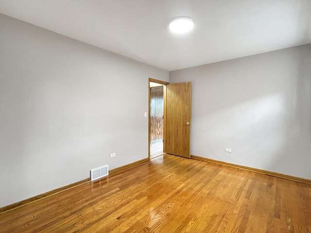 4841 N Natchez Ave, Chicago, IL 60656 - empty room with light wood-type flooring