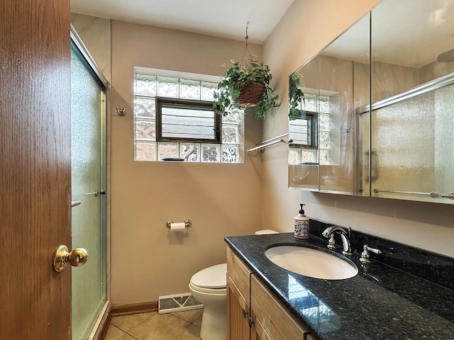 4841 N Natchez Ave, Chicago, IL 60656 - full bathroom with tile patterned flooring, an enclosed shower, and vanity