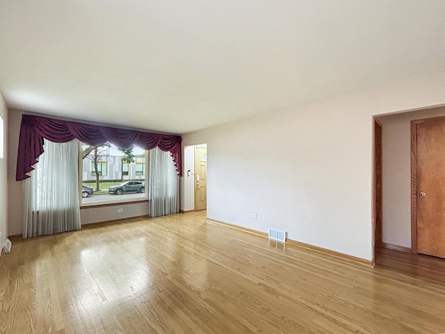4841 N Natchez Ave, Chicago, IL 60656 - empty room featuring light wood-style flooring and baseboards