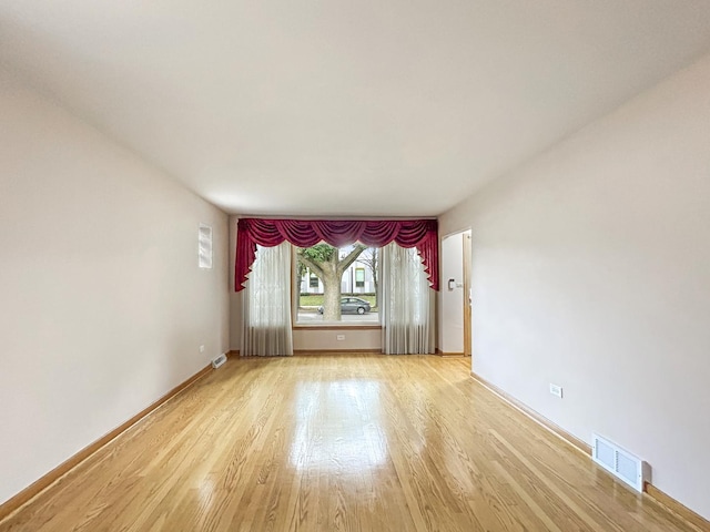 4841 N Natchez Ave, Chicago, IL 60656 - unfurnished room featuring light wood finished floors and baseboards