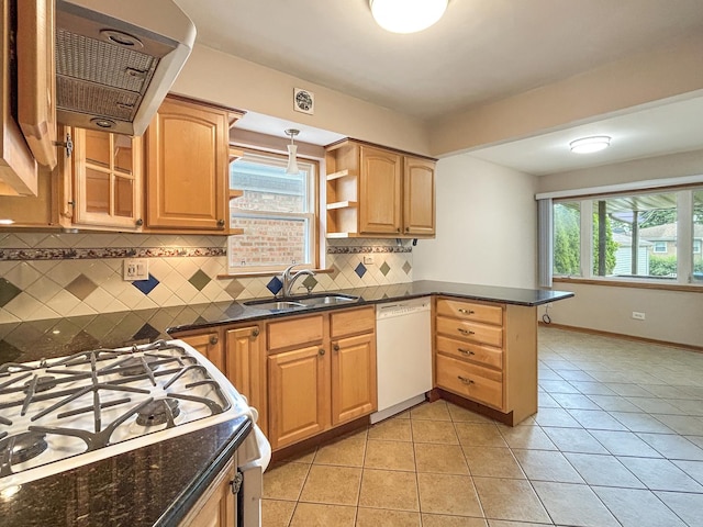 4841 N Natchez Ave, Chicago, IL 60656 - kitchen with white appliances, a peninsula, extractor fan, and tasteful backsplash