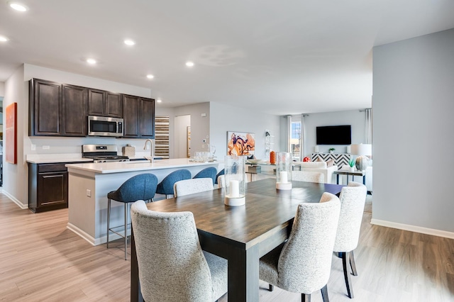 2893 Killarny Dr, Elgin, IL 60124 - dining space featuring light wood-style floors and recessed lighting