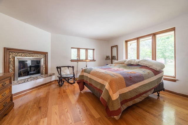 1090 Roselle Rd, Inverness, IL 60067 - bedroom featuring multiple windows and light wood-style flooring