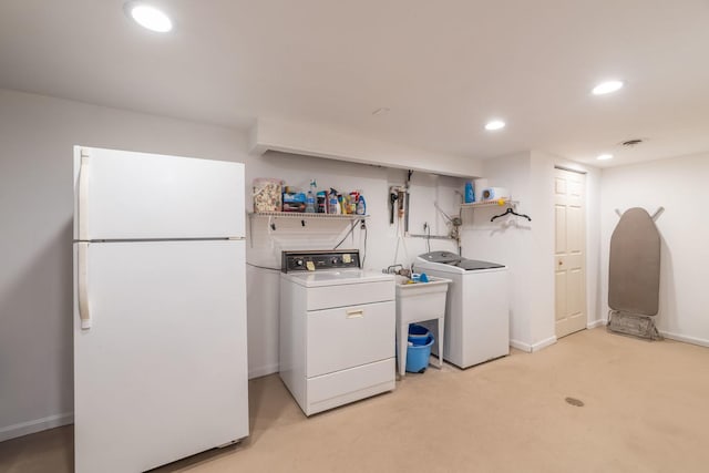 1090 Roselle Rd, Inverness, IL 60067 - laundry area with washing machine and clothes dryer, recessed lighting, and light carpet