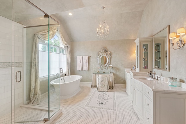 590 Merri Oaks Rd, Barrington Hills, IL 60010 - bathroom with vaulted ceiling, a freestanding bath, vanity, a stall shower, and a chandelier