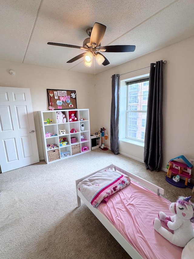 656 Pearson St Unit 512C, Des Plaines, IL 60016 - bedroom with carpet flooring, a ceiling fan, and a textured ceiling