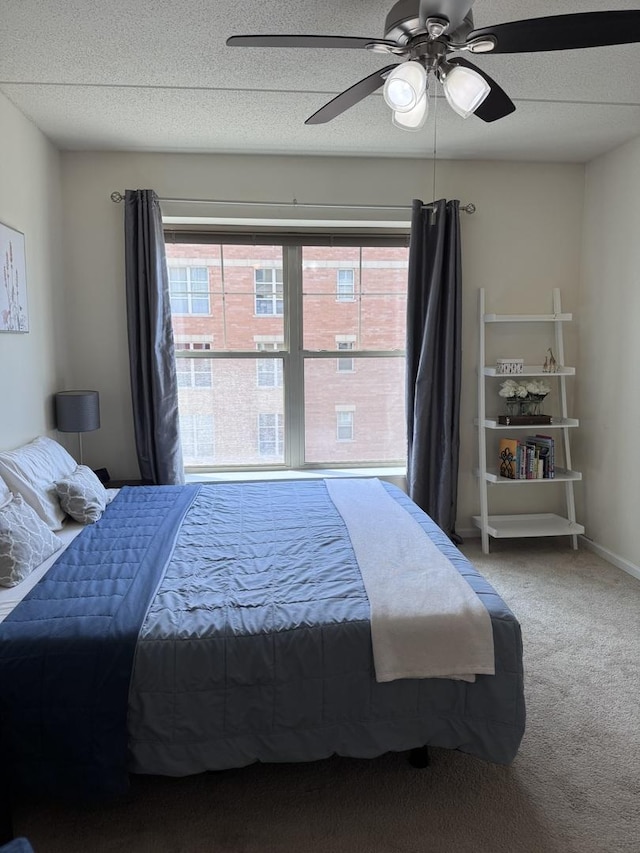 656 Pearson St Unit 512C, Des Plaines, IL 60016 - carpeted bedroom featuring a ceiling fan and a textured ceiling
