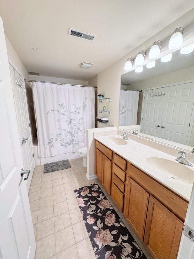 656 Pearson St Unit 512C, Des Plaines, IL 60016 - bathroom with double vanity, tile patterned flooring, and shower / tub combo
