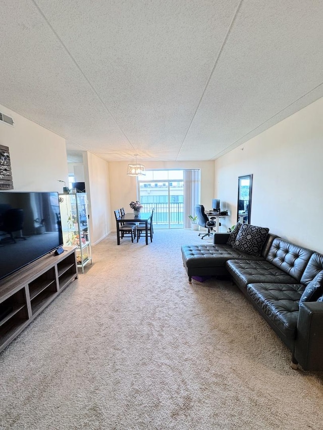 656 Pearson St Unit 512C, Des Plaines, IL 60016 - living room with a textured ceiling, carpet flooring, and a desk