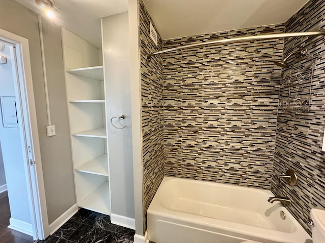 1850 N Clark St Unit 2406, Chicago, IL 60614 - bathroom featuring tub / shower combination and marble finish floors