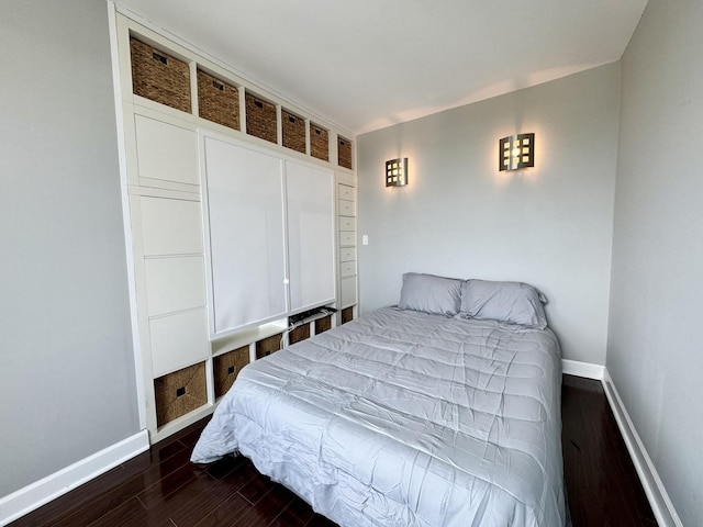 1850 N Clark St Unit 2406, Chicago, IL 60614 - bedroom with dark wood finished floors and baseboards