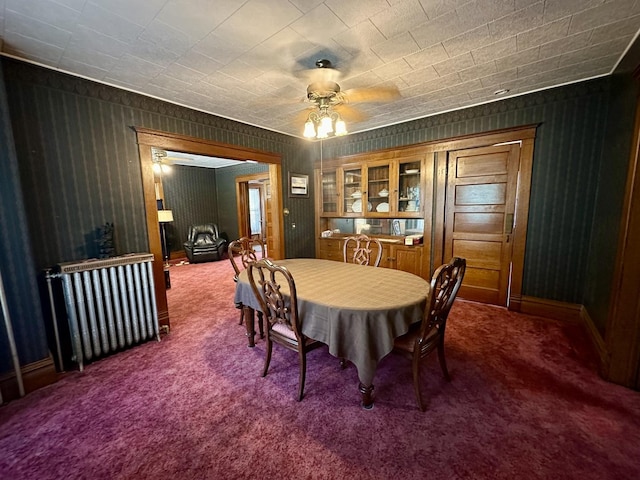 605 Washington St, Prophetstown, IL 61277 - dining room featuring dark colored carpet and a ceiling fan