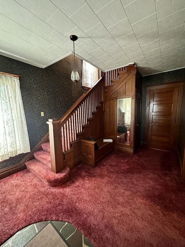 605 Washington St, Prophetstown, IL 61277 - stairs featuring carpet and wallpapered walls