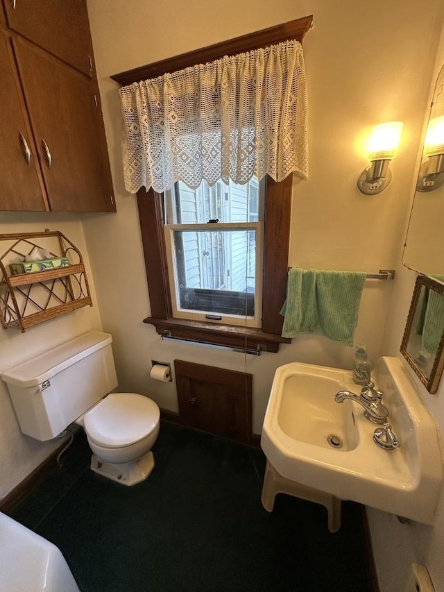 605 Washington St, Prophetstown, IL 61277 - bathroom with toilet and a sink
