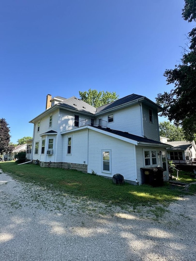 605 Washington St, Prophetstown, IL 61277 - view of home's exterior featuring a chimney