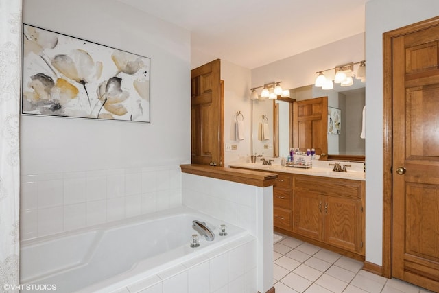 202 Woodboro Dr, West Chicago, IL 60185 - bathroom featuring a garden tub, double vanity, and tile patterned flooring