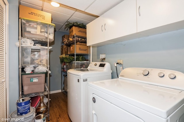 202 Woodboro Dr, West Chicago, IL 60185 - washroom with cabinet space, washer and dryer, and dark wood finished floors