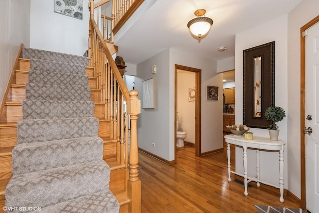 202 Woodboro Dr, West Chicago, IL 60185 - stairs featuring baseboards and wood finished floors