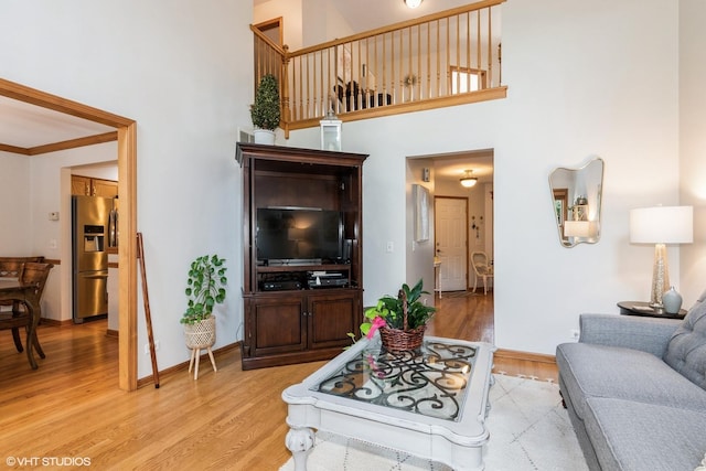202 Woodboro Dr, West Chicago, IL 60185 - living area featuring light wood-style flooring and a high ceiling