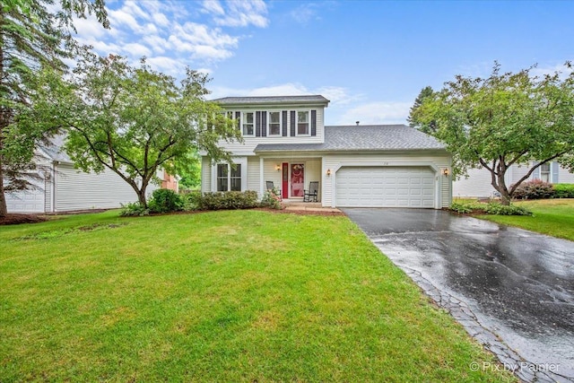 218 Foxmoor Rd, Fox River Grove, IL 60021 - view of front of house with driveway, a garage, and a front lawn