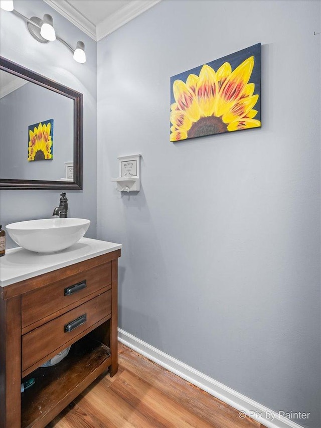 218 Foxmoor Rd, Fox River Grove, IL 60021 - bathroom featuring crown molding, vanity, and wood finished floors