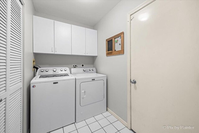 218 Foxmoor Rd, Fox River Grove, IL 60021 - laundry area with cabinet space, washing machine and dryer, and light tile patterned flooring