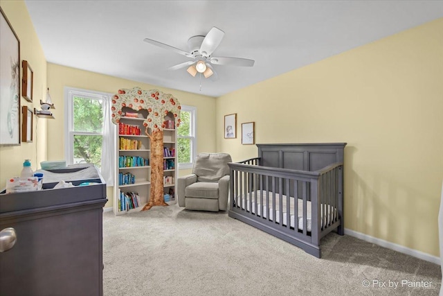 218 Foxmoor Rd, Fox River Grove, IL 60021 - bedroom with carpet floors, ceiling fan, and a nursery area