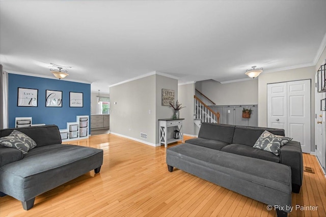 218 Foxmoor Rd, Fox River Grove, IL 60021 - living room with light wood finished floors, stairs, and ornamental molding