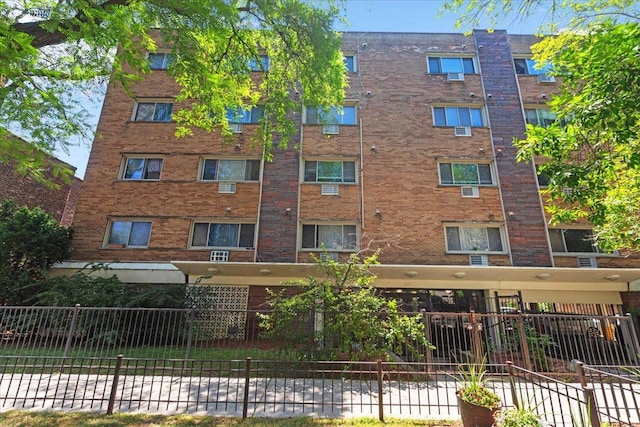 1415 W Lunt Ave Unit 402, Chicago, IL 60626 - view of apartment building / complex