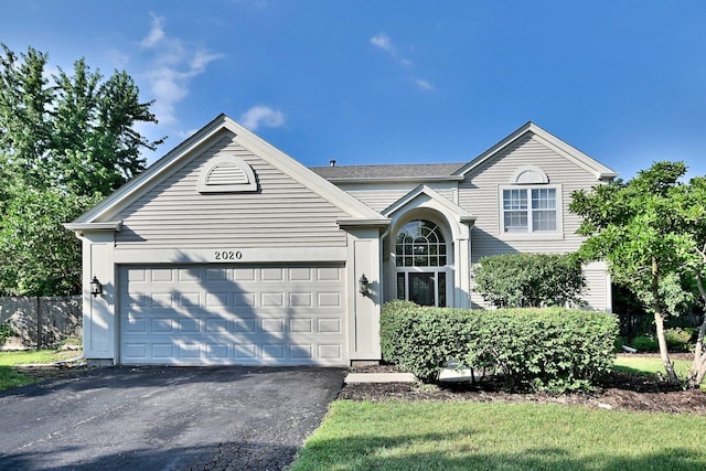 2020 Medinah Cir, Elgin, IL 60123 - view of front of home with driveway and a garage
