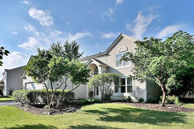 2020 Medinah Cir, Elgin, IL 60123 - view of front of property with a front lawn and an attached garage
