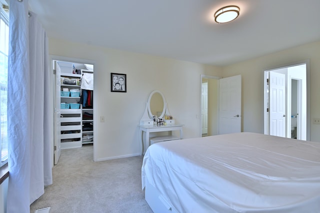 2020 Medinah Cir, Elgin, IL 60123 - carpeted bedroom with a spacious closet and baseboards