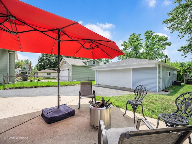 3916 N Adams St, Westmont, IL 60559 - view of patio with an outdoor structure and a detached garage