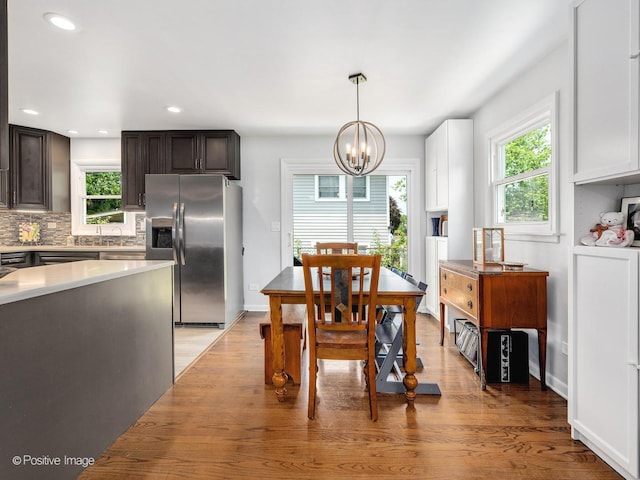 3916 N Adams St, Westmont, IL 60559 - dining area featuring a chandelier, healthy amount of natural light, light wood-type flooring, and recessed lighting