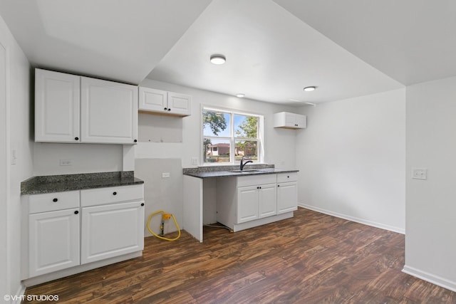 14449 Kenton Ave, Midlothian, IL 60445 - kitchen featuring dark wood-type flooring, white cabinetry, and dark stone countertops