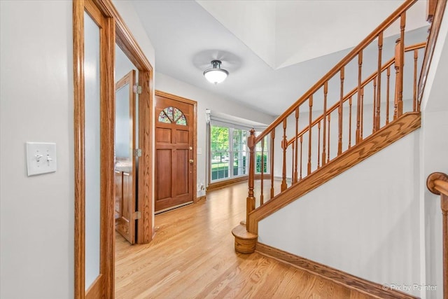 906 Ridgewood Dr, Cary, IL 60013 - entryway featuring wood finished floors and stairs