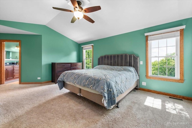 906 Ridgewood Dr, Cary, IL 60013 - carpeted bedroom with vaulted ceiling and ceiling fan