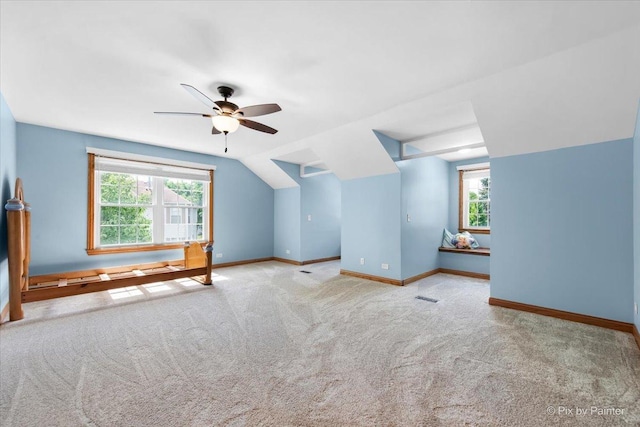 906 Ridgewood Dr, Cary, IL 60013 - additional living space featuring ceiling fan, carpet, and lofted ceiling