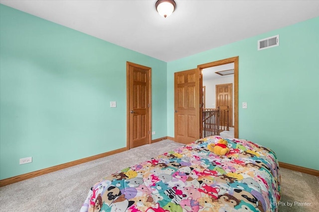906 Ridgewood Dr, Cary, IL 60013 - carpeted bedroom featuring baseboards