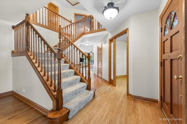 906 Ridgewood Dr, Cary, IL 60013 - foyer entrance with wood finished floors and stairway