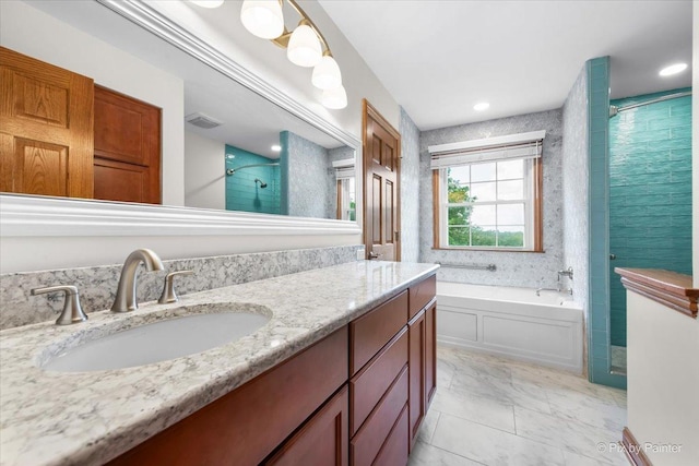 906 Ridgewood Dr, Cary, IL 60013 - full bath featuring a shower stall, a garden tub, double vanity, and marble finish flooring
