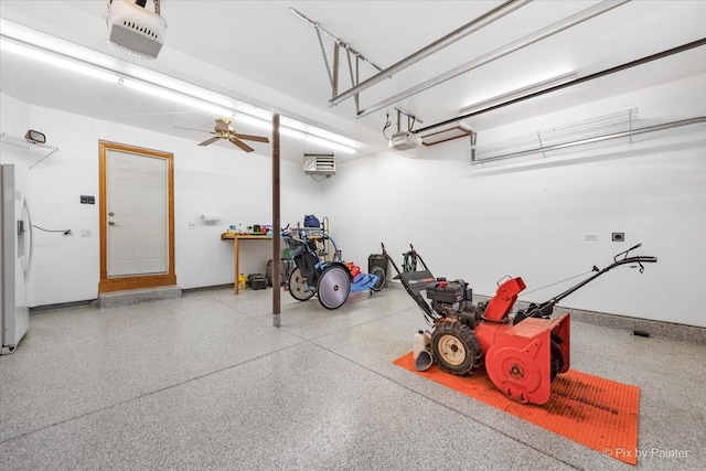 906 Ridgewood Dr, Cary, IL 60013 - garage with a garage door opener and white fridge with ice dispenser