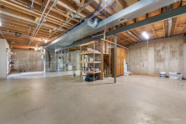 906 Ridgewood Dr, Cary, IL 60013 - unfinished below grade area featuring water heater and heating unit
