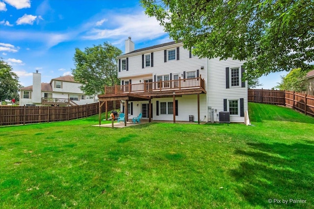 906 Ridgewood Dr, Cary, IL 60013 - back of house featuring a chimney, a fenced backyard, a wooden deck, and a patio area
