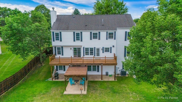 906 Ridgewood Dr, Cary, IL 60013 - rear view of property with a patio, a wooden deck, a chimney, and a yard
