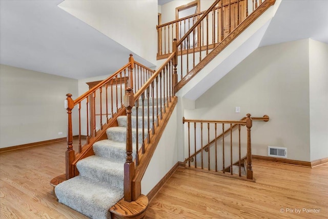 906 Ridgewood Dr, Cary, IL 60013 - stairway featuring wood finished floors and baseboards