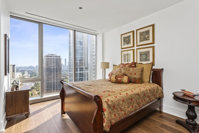 363 E Wacker Dr Unit 2503, Chicago, IL 60601 - bedroom featuring wood finished floors and a view of city