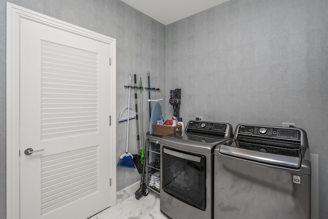 363 E Wacker Dr Unit 2503, Chicago, IL 60601 - laundry room featuring washer and dryer and marble look tiles